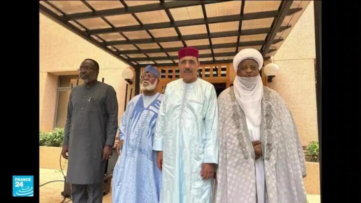 An ECOWAS delegation met with Niger's ousted President Mohamed Bazoum (centre) in the presence of a junta member in Niamey, Niger on August 19, 2023.